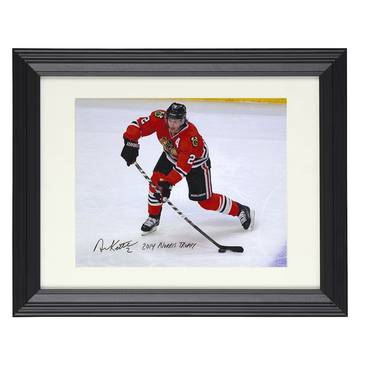Duncan Keith – Chicago Skating Action 8x10 matted black framed hockey wall art