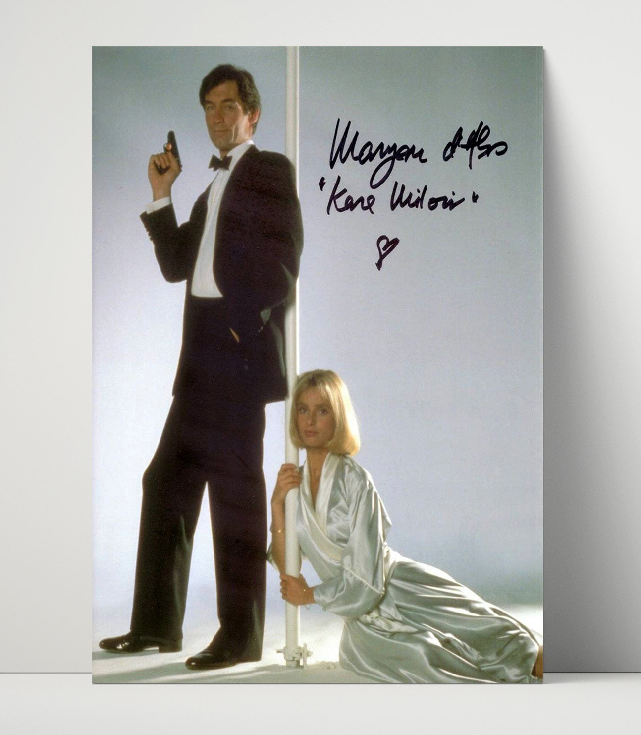 The Living Daylights - Maryam dAbo - Kara Milovy - Bond Girl In Silver Satin Pose movie wall art 16x20 Unframed Print