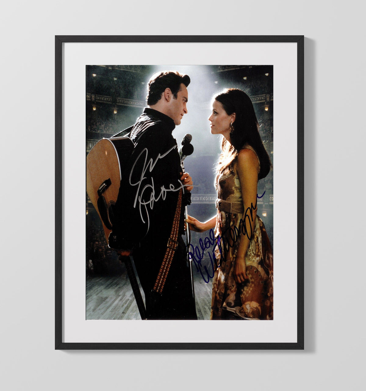 Walk the Line - Joaquin Phoenix - Johnny Cash - Reese Witherspoon - June Carter - Intimate Stage Moment - Movies Framed Print
