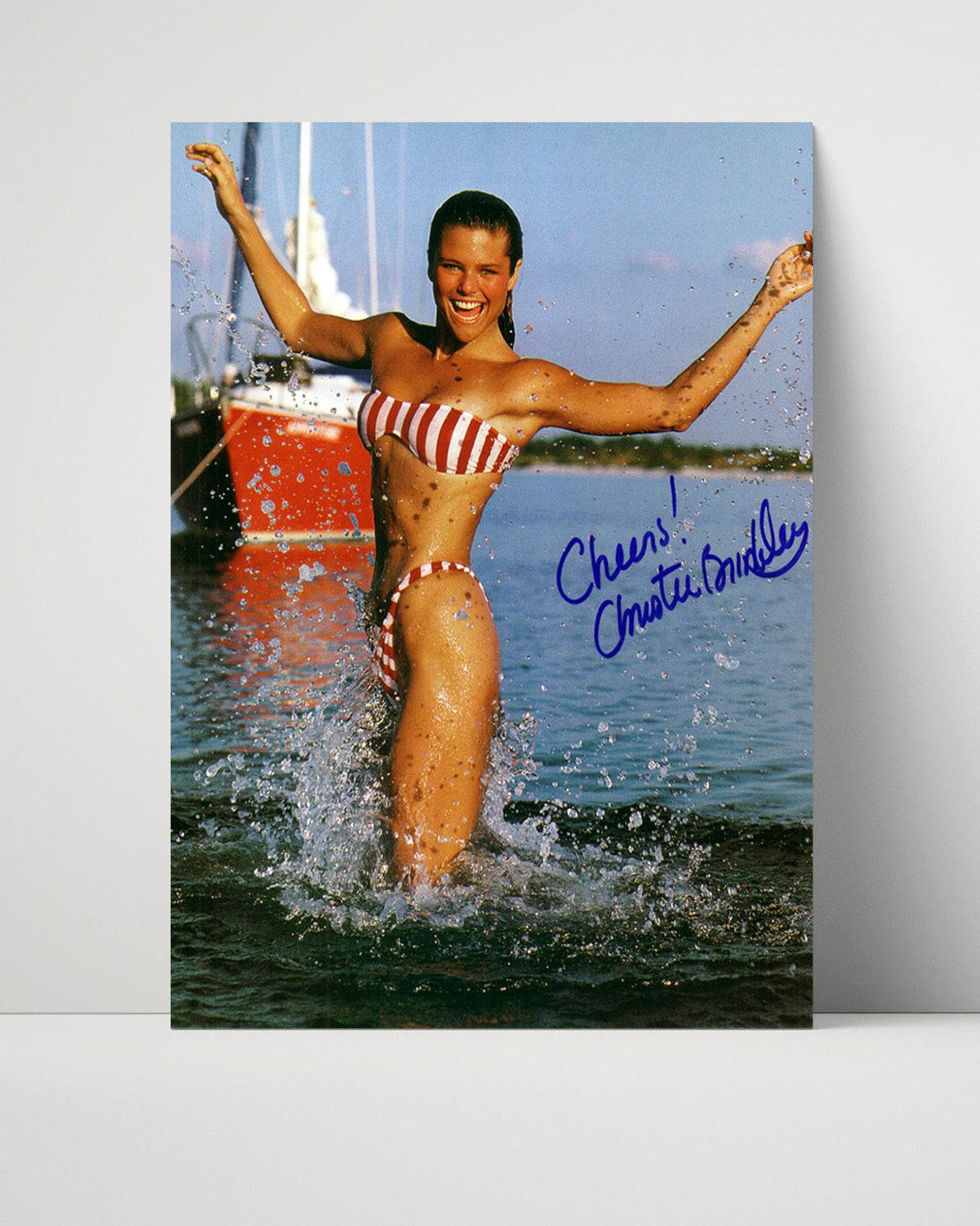 Christie Brinkley – Classic Red Stripe Bikini SI unframed semi-gloss poster print