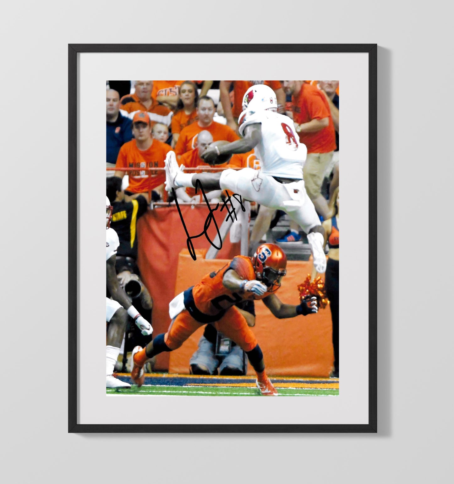 Louisville Football Lamar Jackson Airborne End Zone Leap College Football Wall Art 16x20 Gallery Frame wall art print – College Football decor