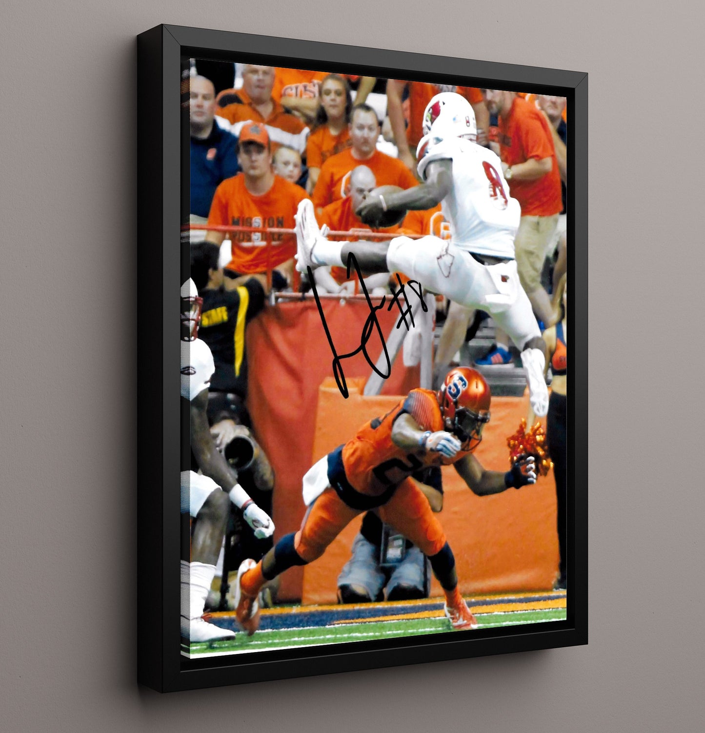 Louisville Football Lamar Jackson Airborne End Zone Leap College Football Wall Art 16x20 Framed Canvas wall art print – College Football decor