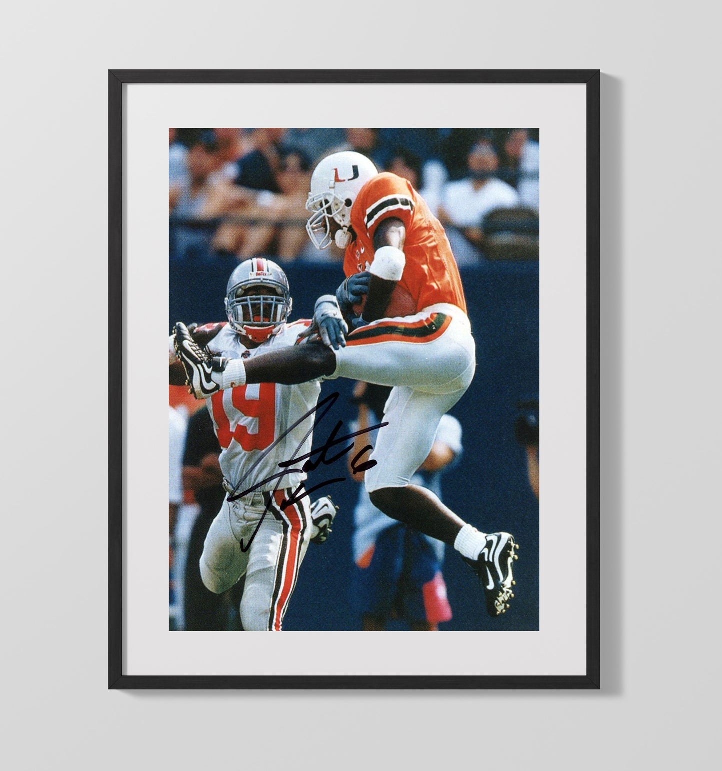 Miami Football Santana Moss Explosive Open Field Move College Football Wall Art 16x20 Gallery Frame wall art print – College Football decor