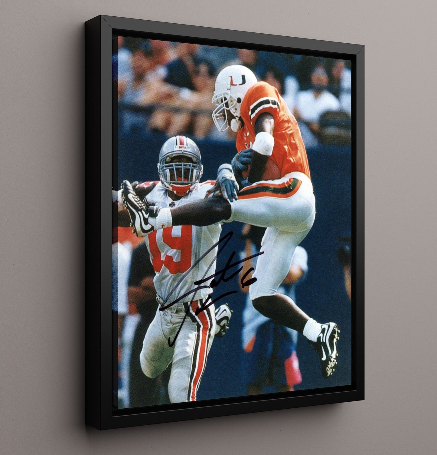 Miami Football Santana Moss Explosive Open Field Move College Football Wall Art 16x20 Framed Canvas wall art print – College Football decor