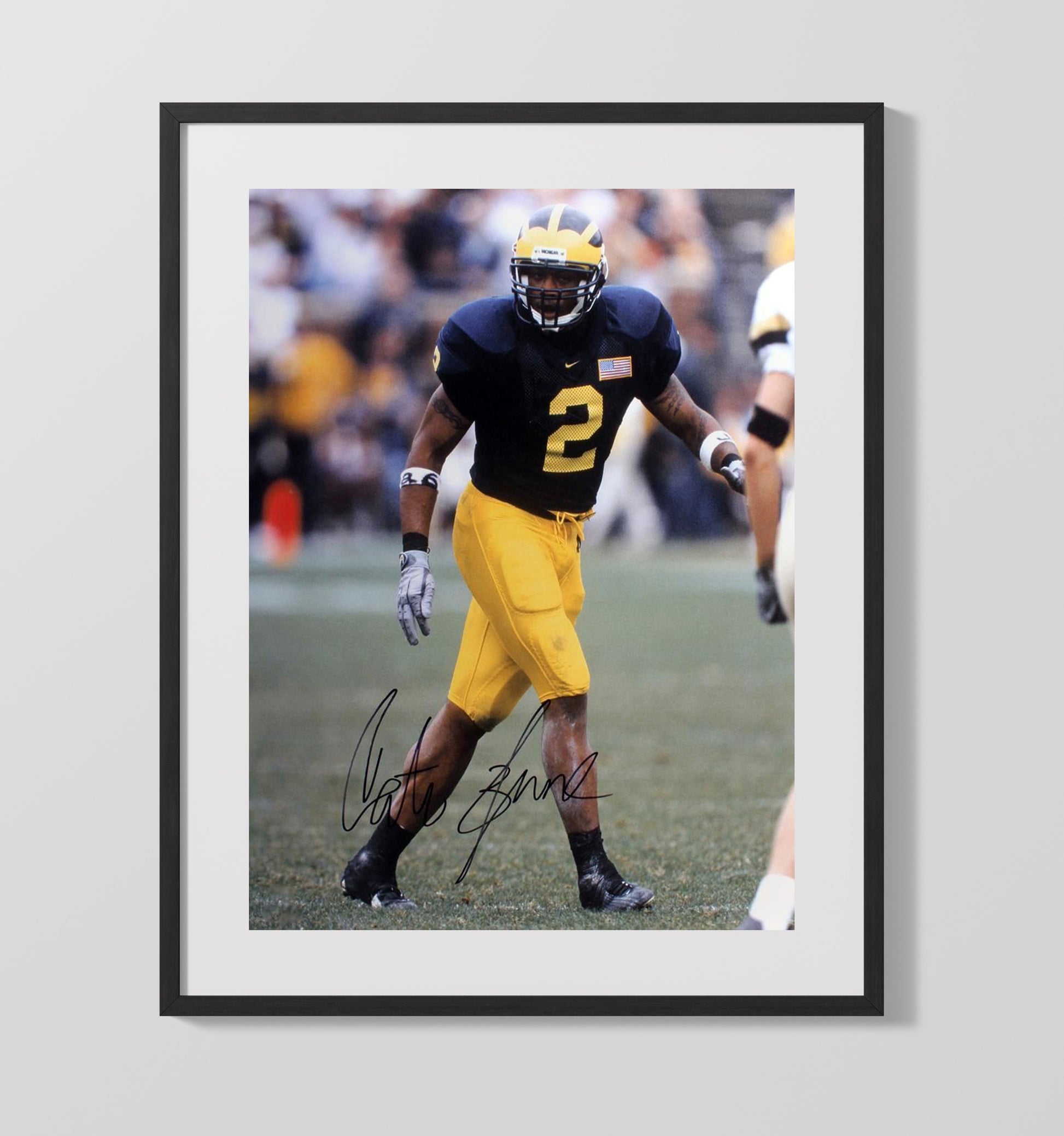 Michigan Football Cato June Defensive Presence College Football Wall Art 16x20 Gallery Frame wall art print – College Football decor