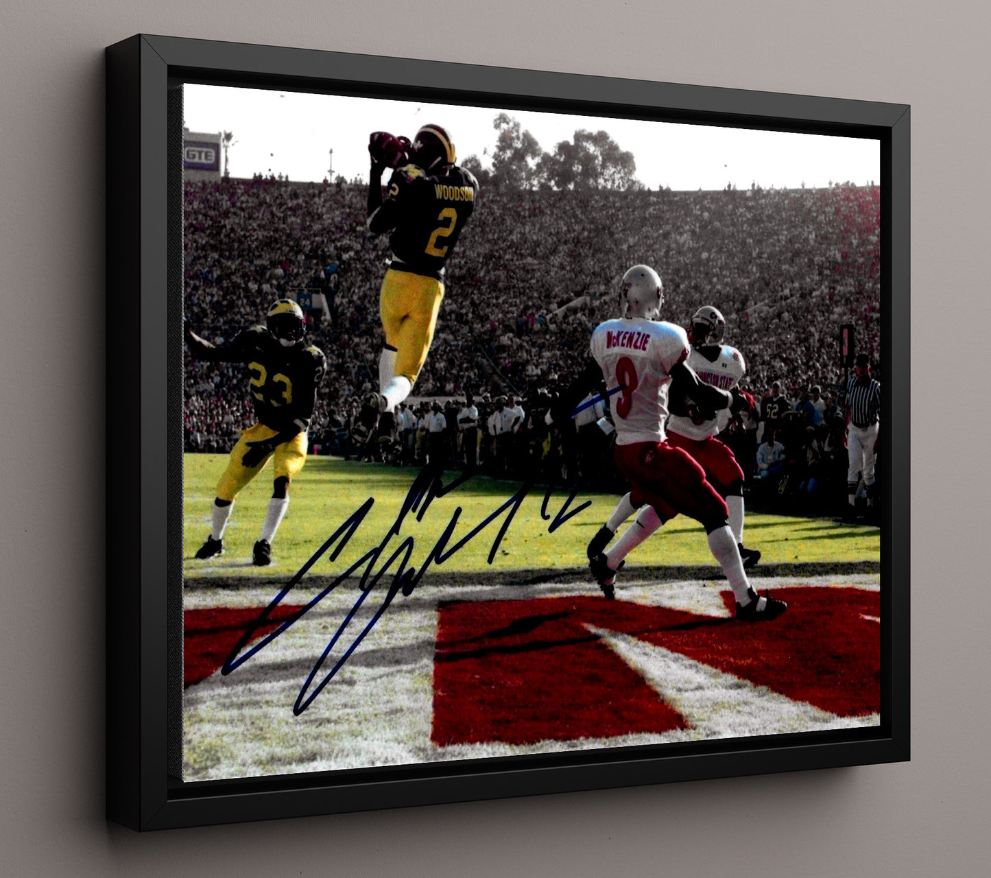 Michigan Football Charles Woodson Leaping Interception Heisman Moment College Football Wall Art 16x20 Framed Canvas wall art print – College Football decor