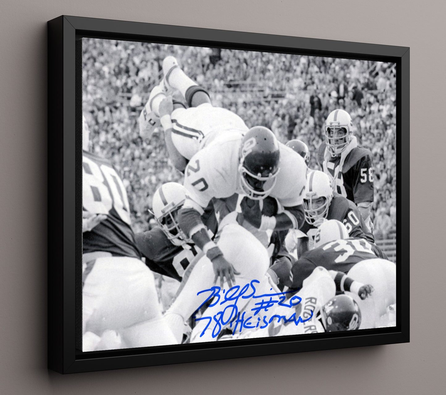 Oklahoma Football Billy Sims Goal Line Dive Over Defender College Football Wall Art 16x20 Framed Canvas wall art print – College Football decor