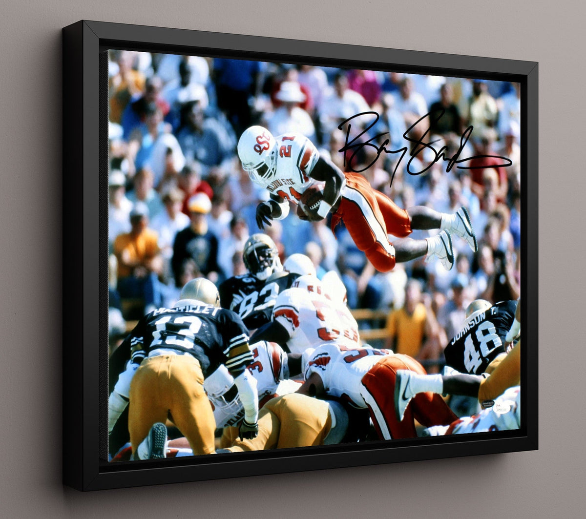 Oklahoma State Football - Barry SandersHurdle Over Defender 8x10 Framed Canvas college football wall art