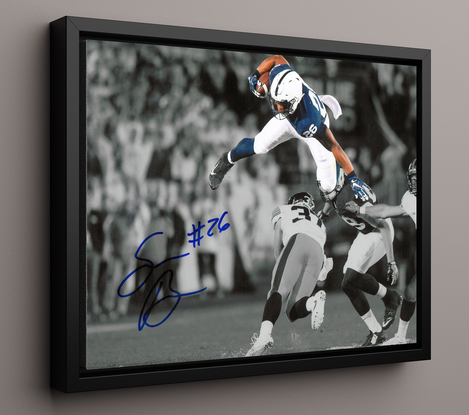 Penn State Football - Saquon BarkleyMidair Leap 8x10 Framed Canvas college football wall art