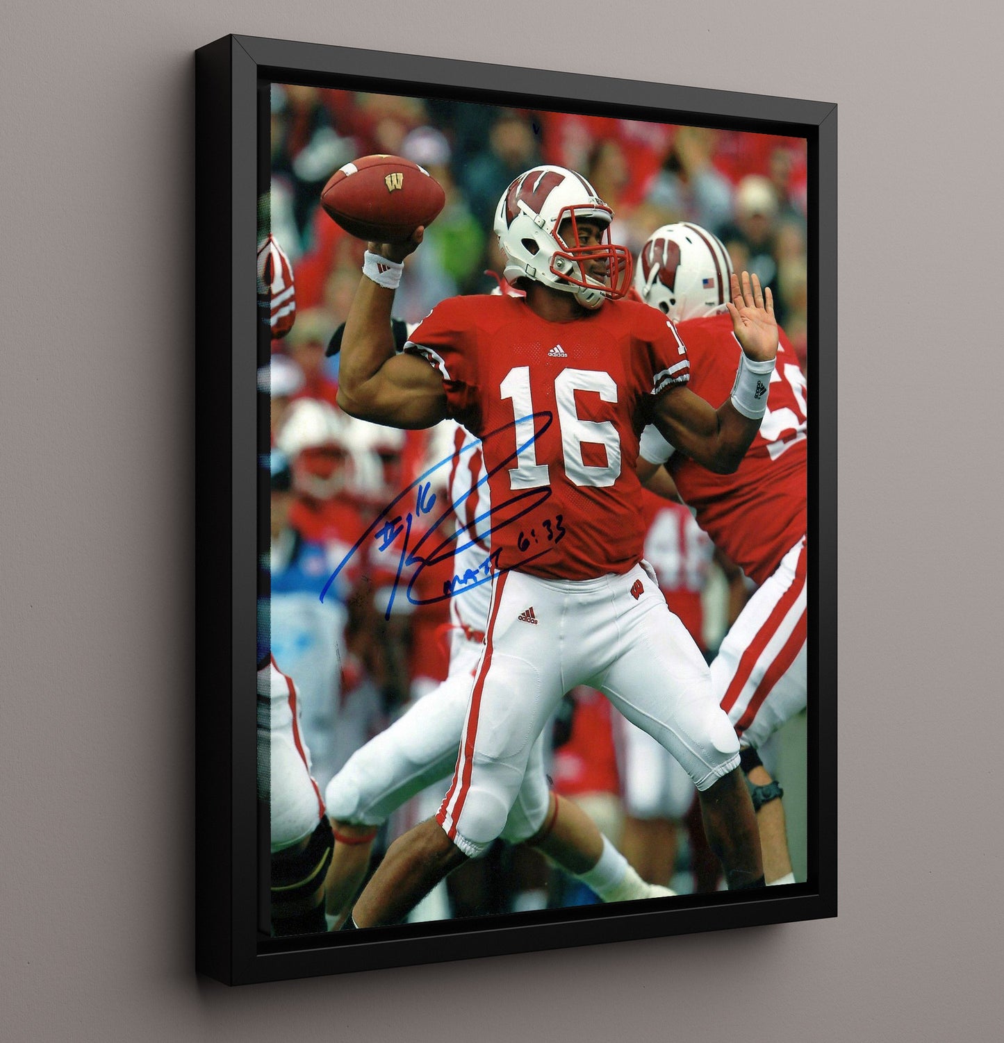 Wisconsin Football Russell Wilson Badger Bombs Away Passing Motion College Football Wall Art 16x20 Framed Canvas wall art print – College Football decor