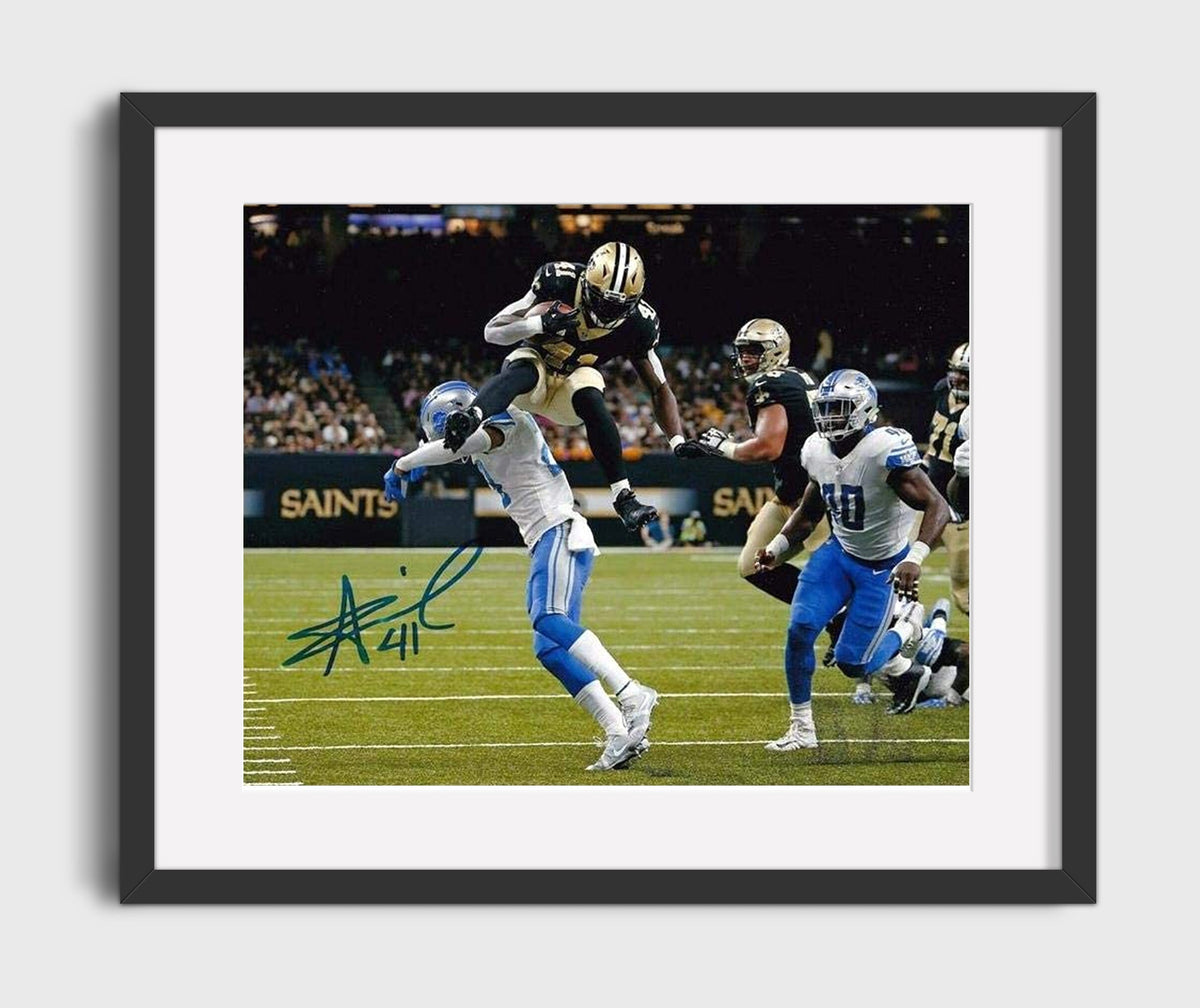 Alvin Kamara - New Orleans Football Leap Over Defender - Vintage Football Wall Art - Football Framed Print