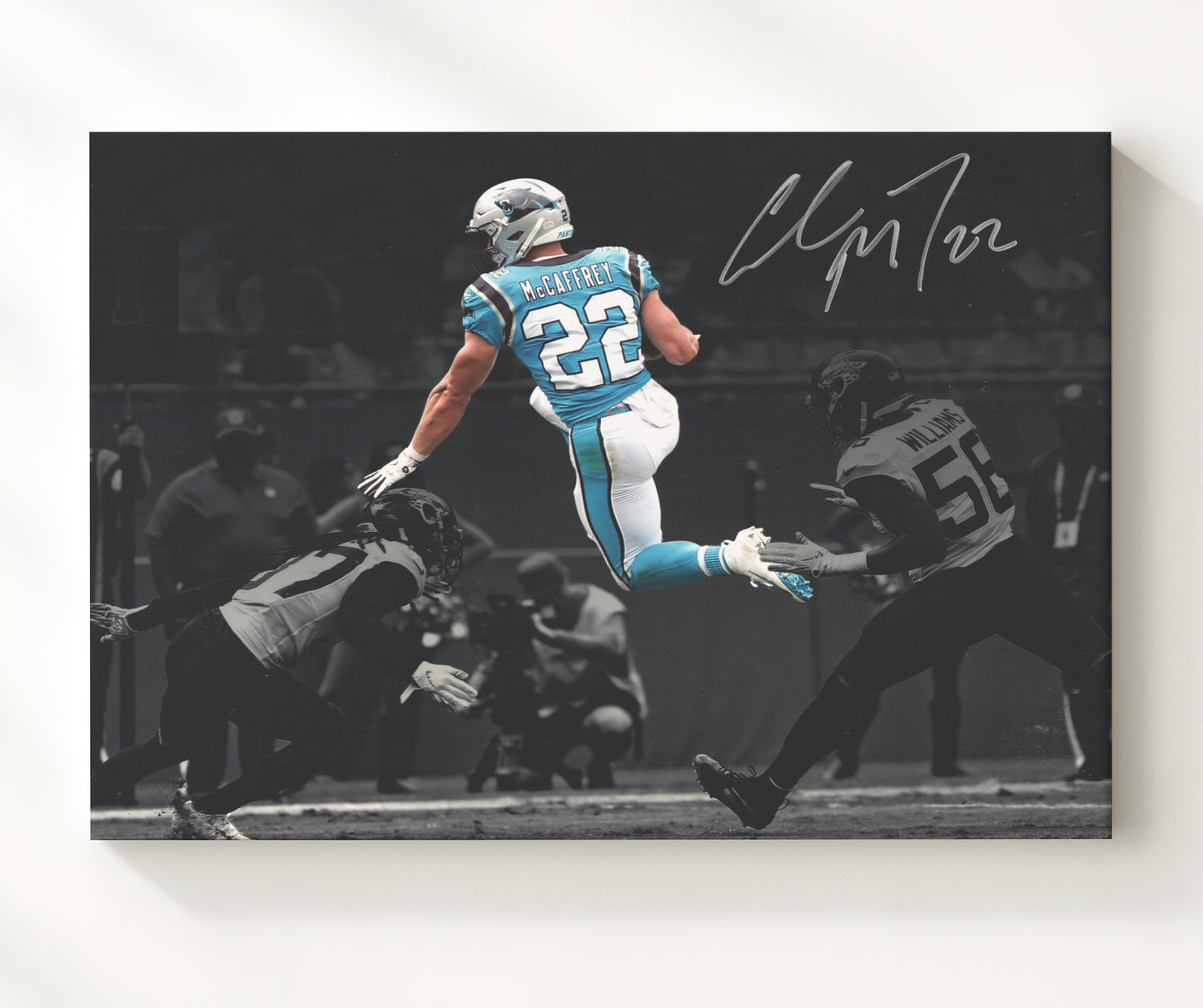 Christian McCaffrey Carolina Leap Over Defender Air CMC Football Wall Art 16x20 Canvas Wall Art wall art print - Football decor