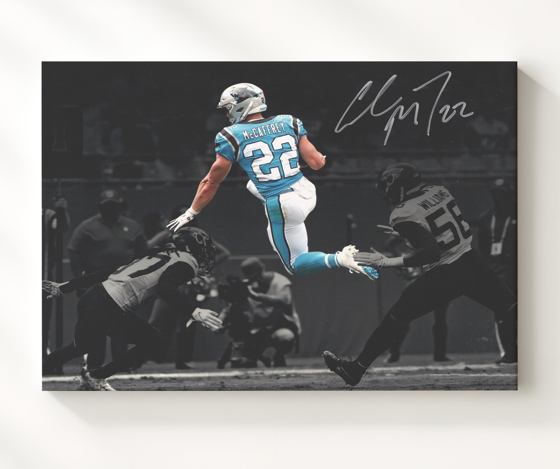 Christian McCaffrey Carolina Leap Over Defender Air CMC Football Wall Art 16x20 Canvas Wall Art wall art print - Football decor