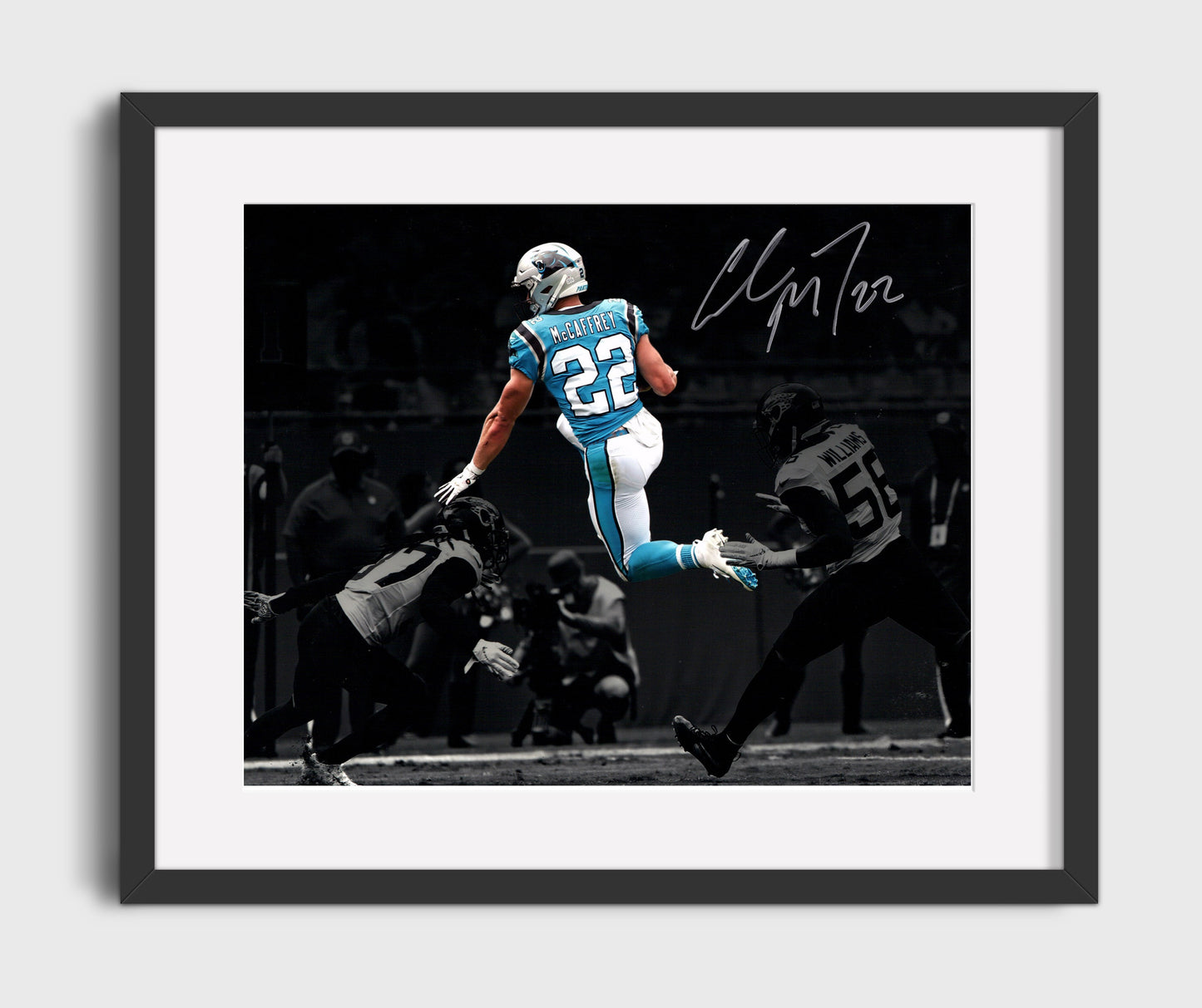 Christian McCaffrey Carolina Leap Over Defender Air CMC Football Wall Art 16x20 Gallery Framed Artwork wall art print - Football decor