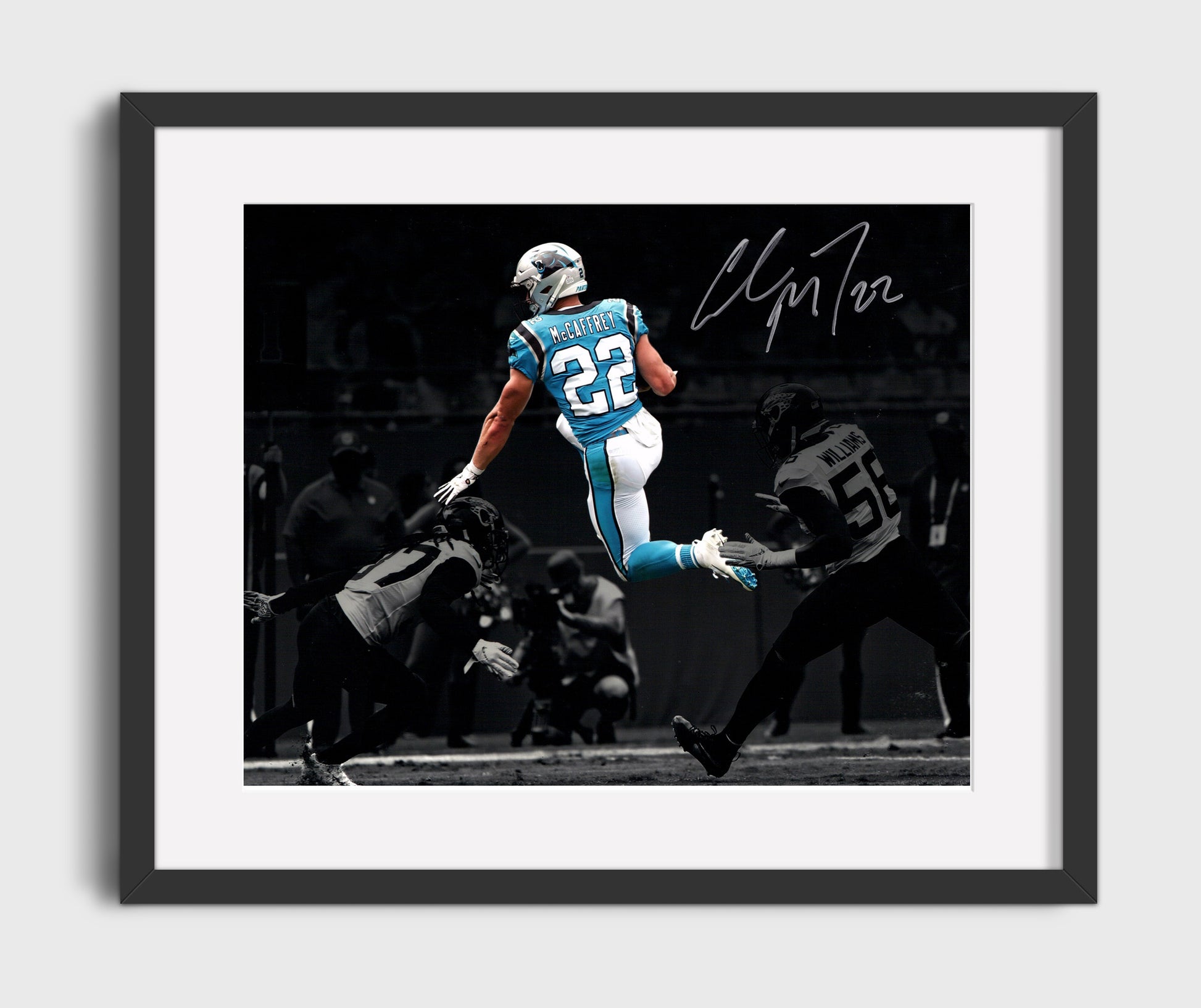 Christian McCaffrey Carolina Leap Over Defender Air CMC Football Wall Art 16x20 Gallery Framed Artwork wall art print - Football decor