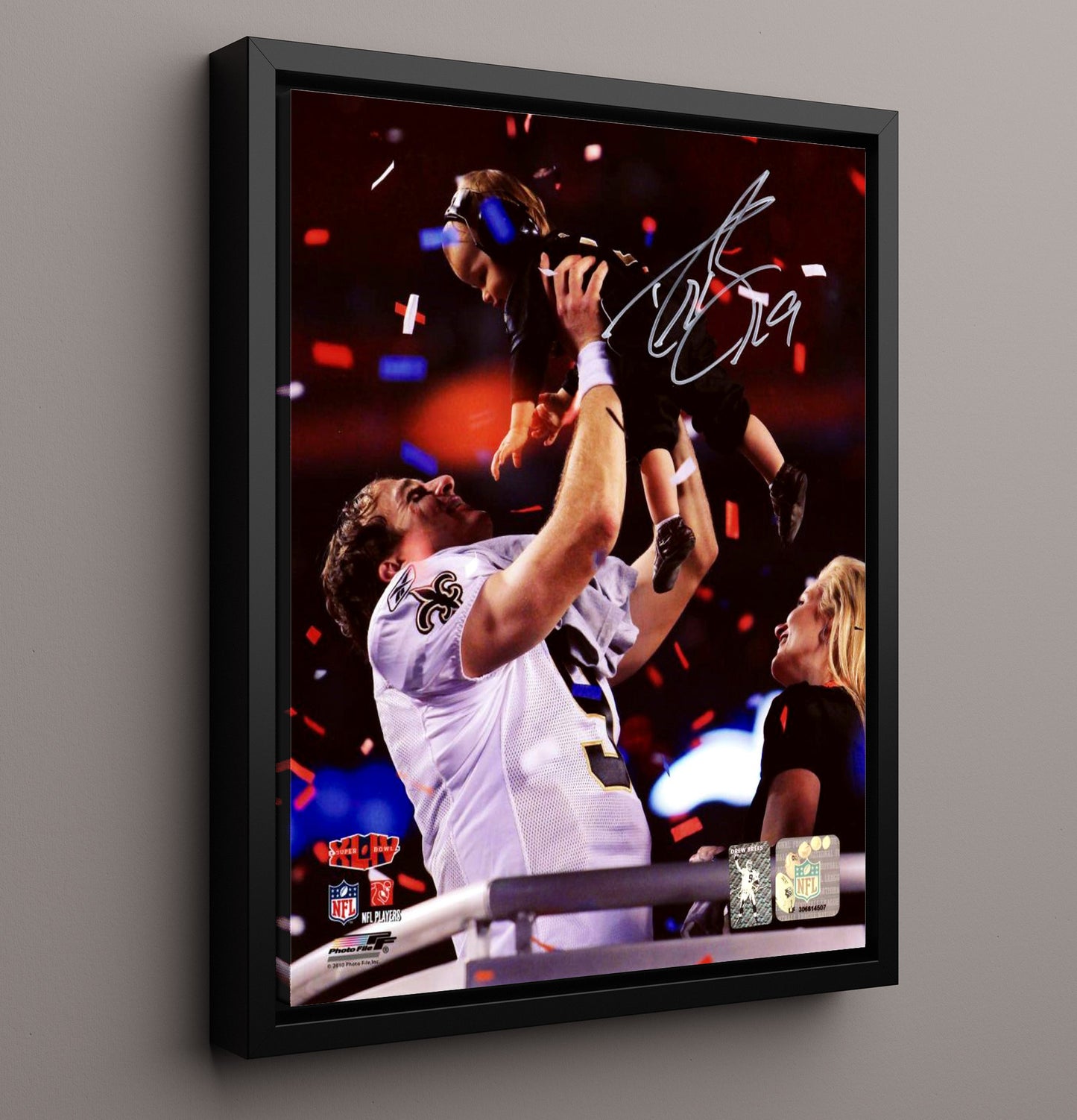Drew Brees - New Orleans football Super Bowl XLIV Celebration Lifting Son Vintage Football Wall Art - 16x20 Framed Canvas football decor