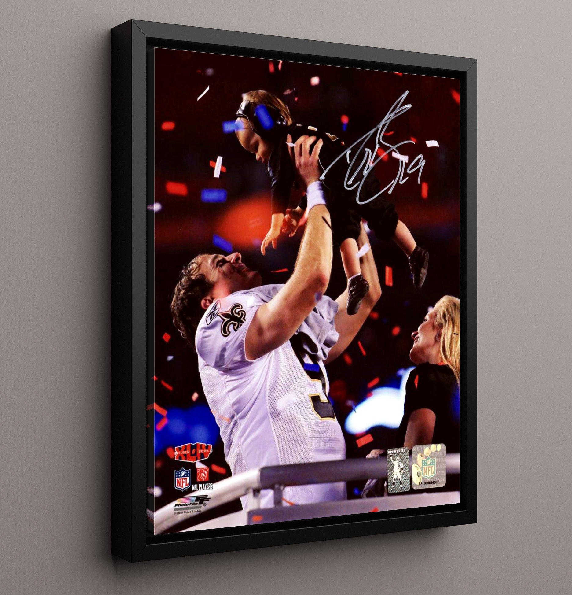 Drew Brees - New Orleans football Super Bowl XLIV Celebration Lifting Son Vintage Football Wall Art - 16x20 Framed Canvas football decor