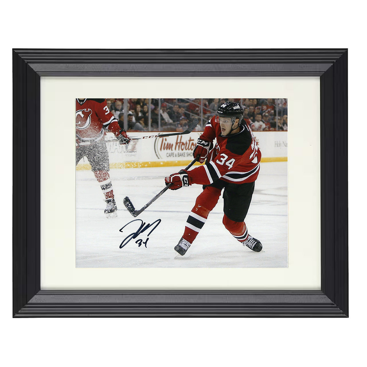 Jon Merrill – New Jersey Skating Action Red Jersey 8x10 matted black framed hockey wall art