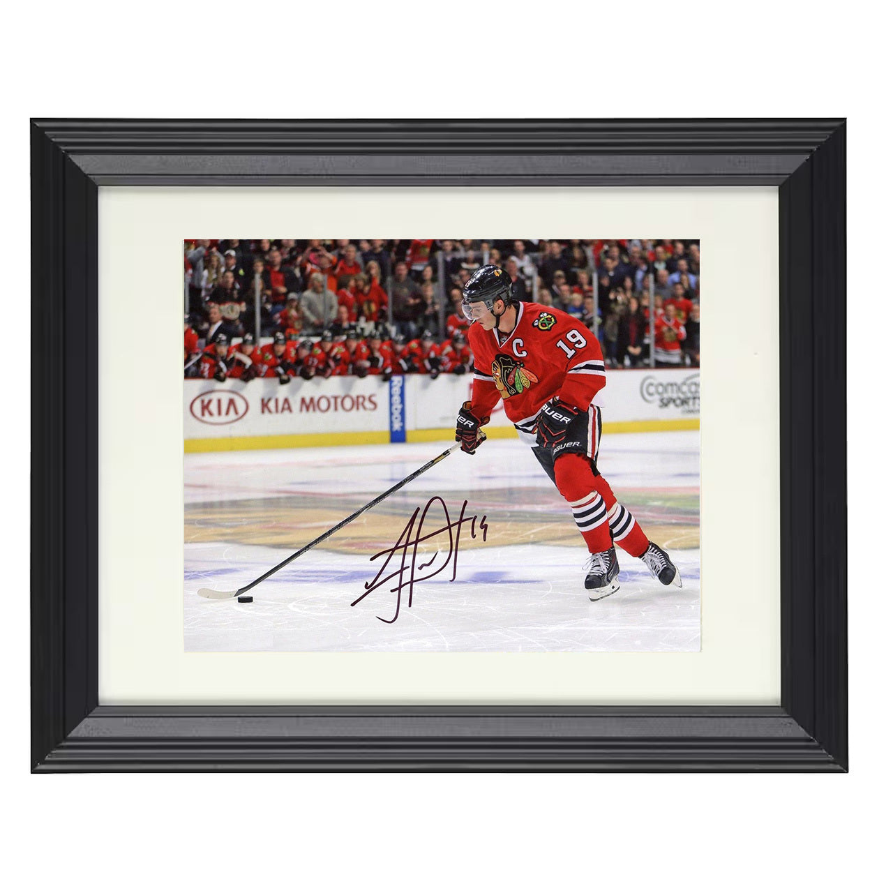 Jonathan Toews – Chicago Captain Skating Action 8x10 matted black framed hockey wall art