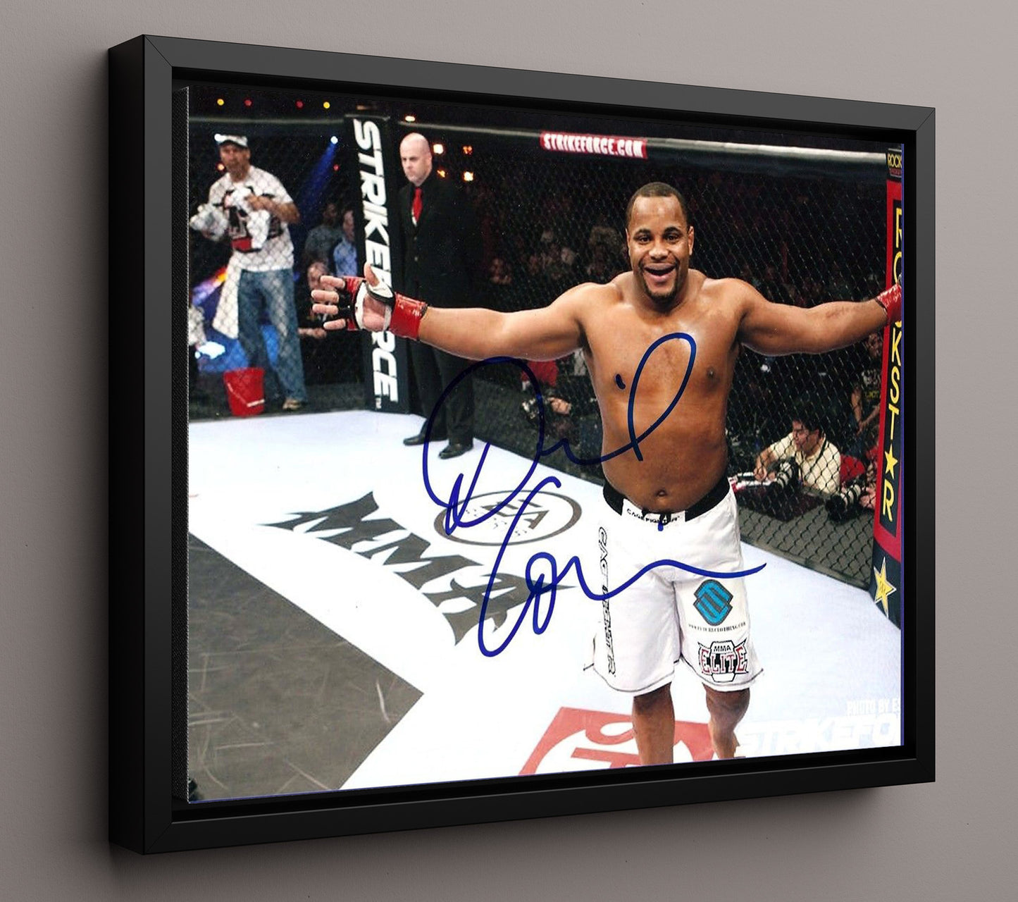 Daniel Cormier - Strikeforce Victory Pose MMA Wall Art 16x20 Framed Canvas wall art print – MMA Wall Art decor