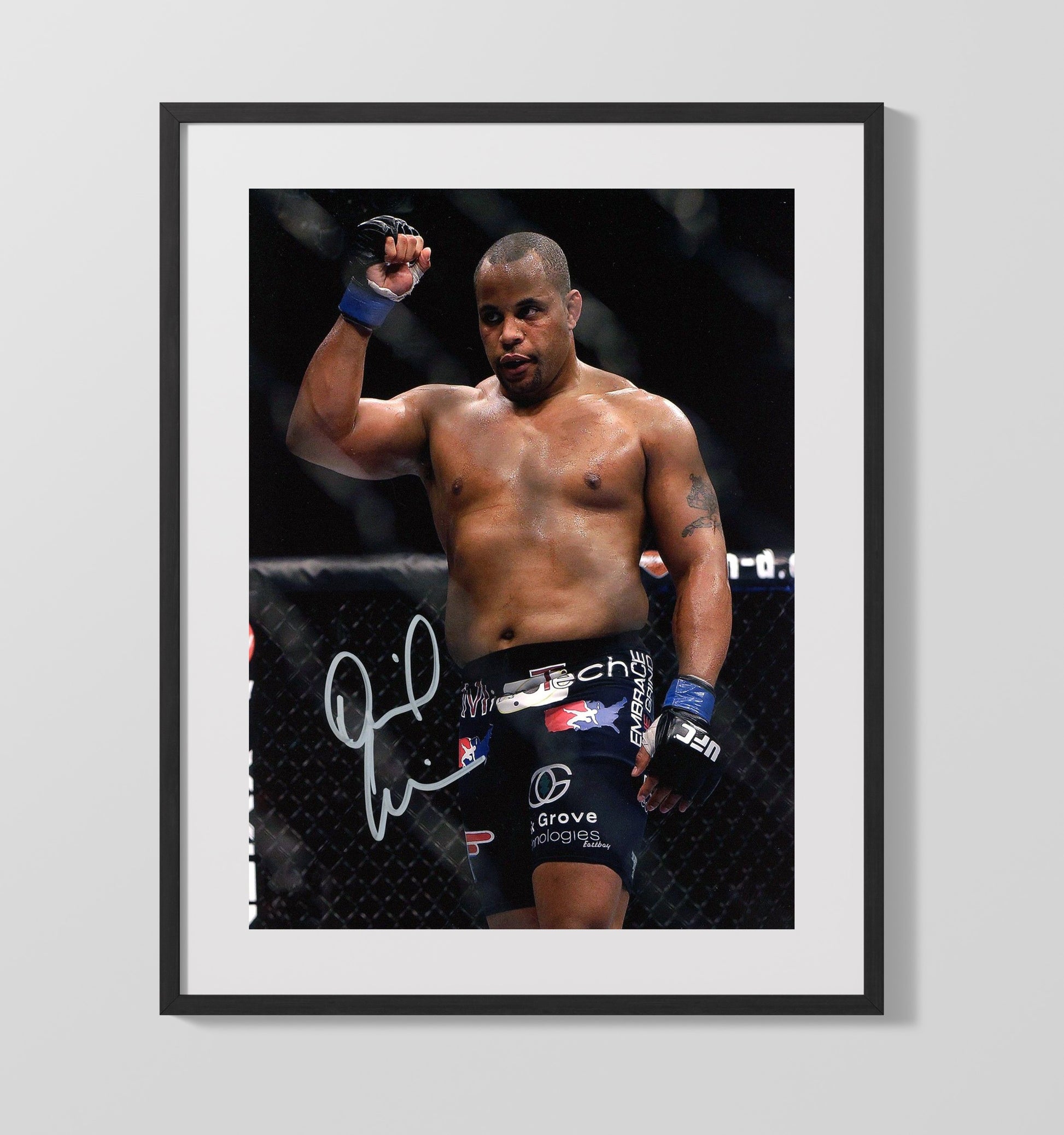 Daniel Cormier - Victory Fist Raise MMA Wall Art 16x20 Gallery Frame wall art print – MMA Wall Art decor