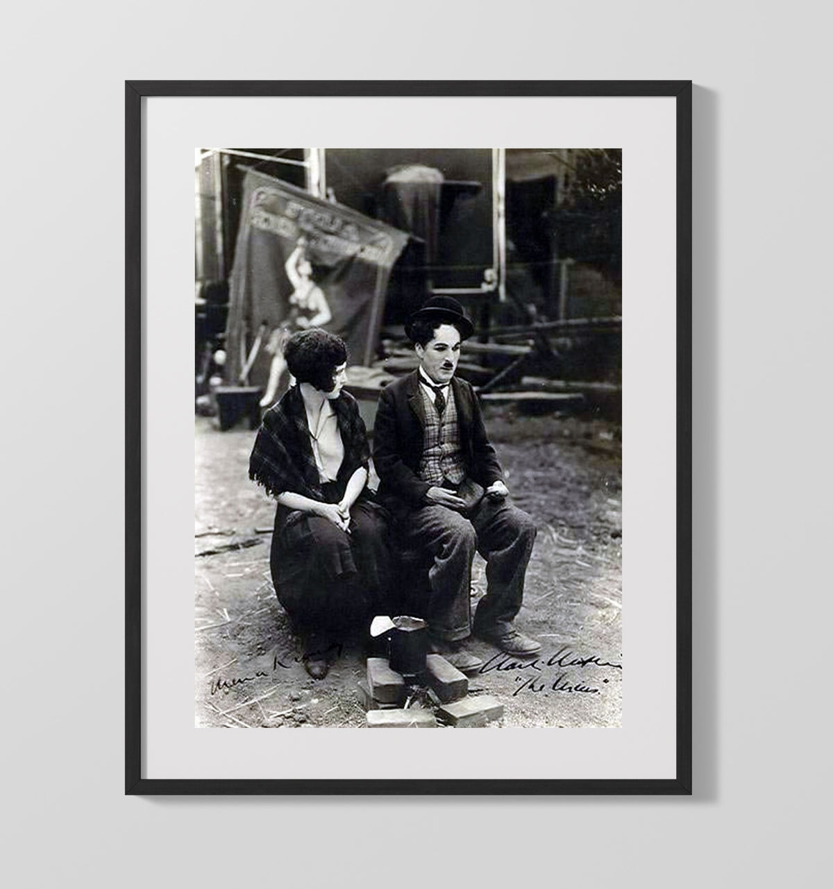 Charlie Chaplin and Edna Purviance - Silent Film Set Benchside Moment movie wall art 16x20 Gallery Frame