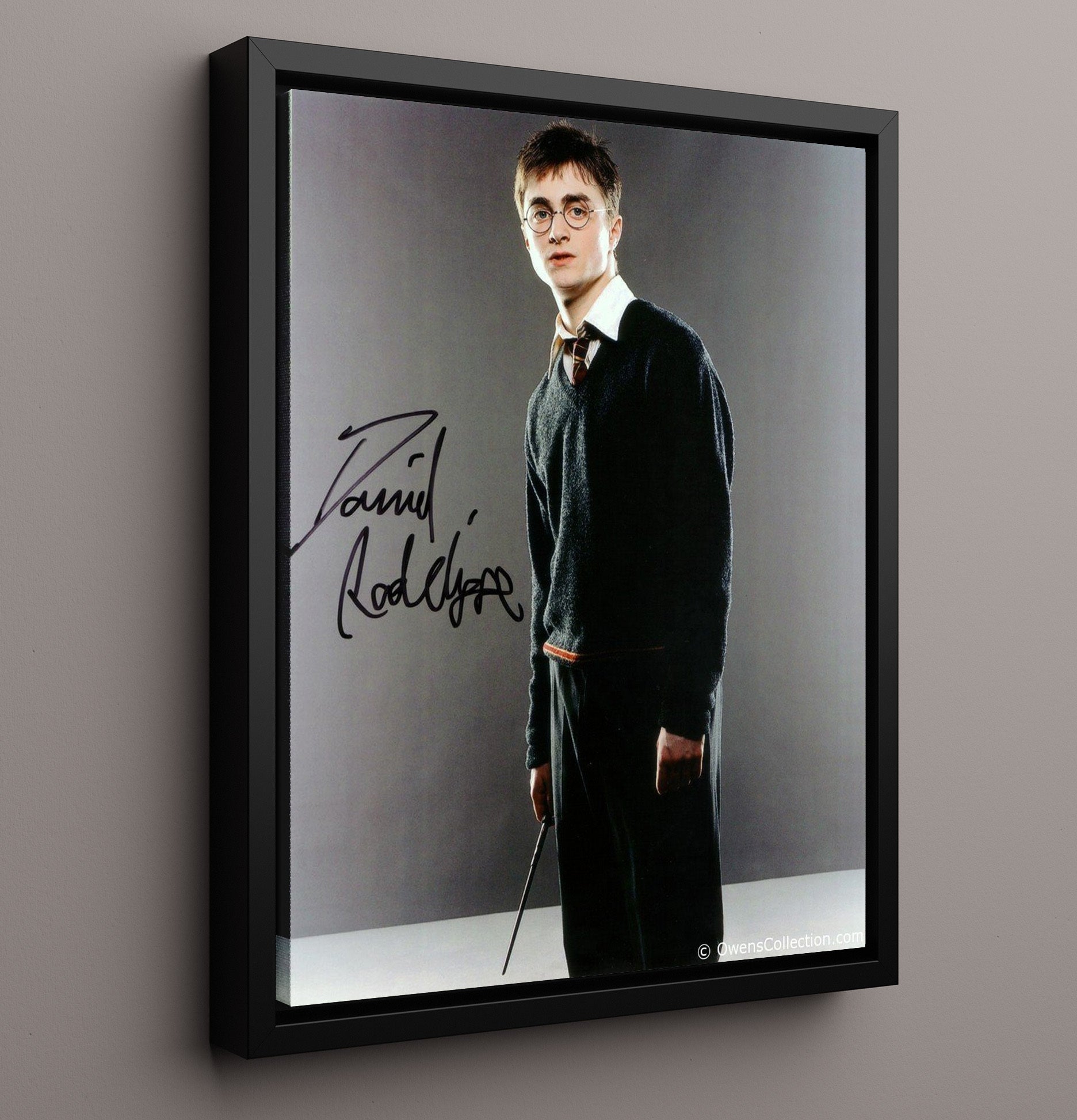 Harry Potter - Daniel Radcliffe - Harry Potter - Wand School Uniform Studio Shot movie wall art 16x20 Framed Canvas