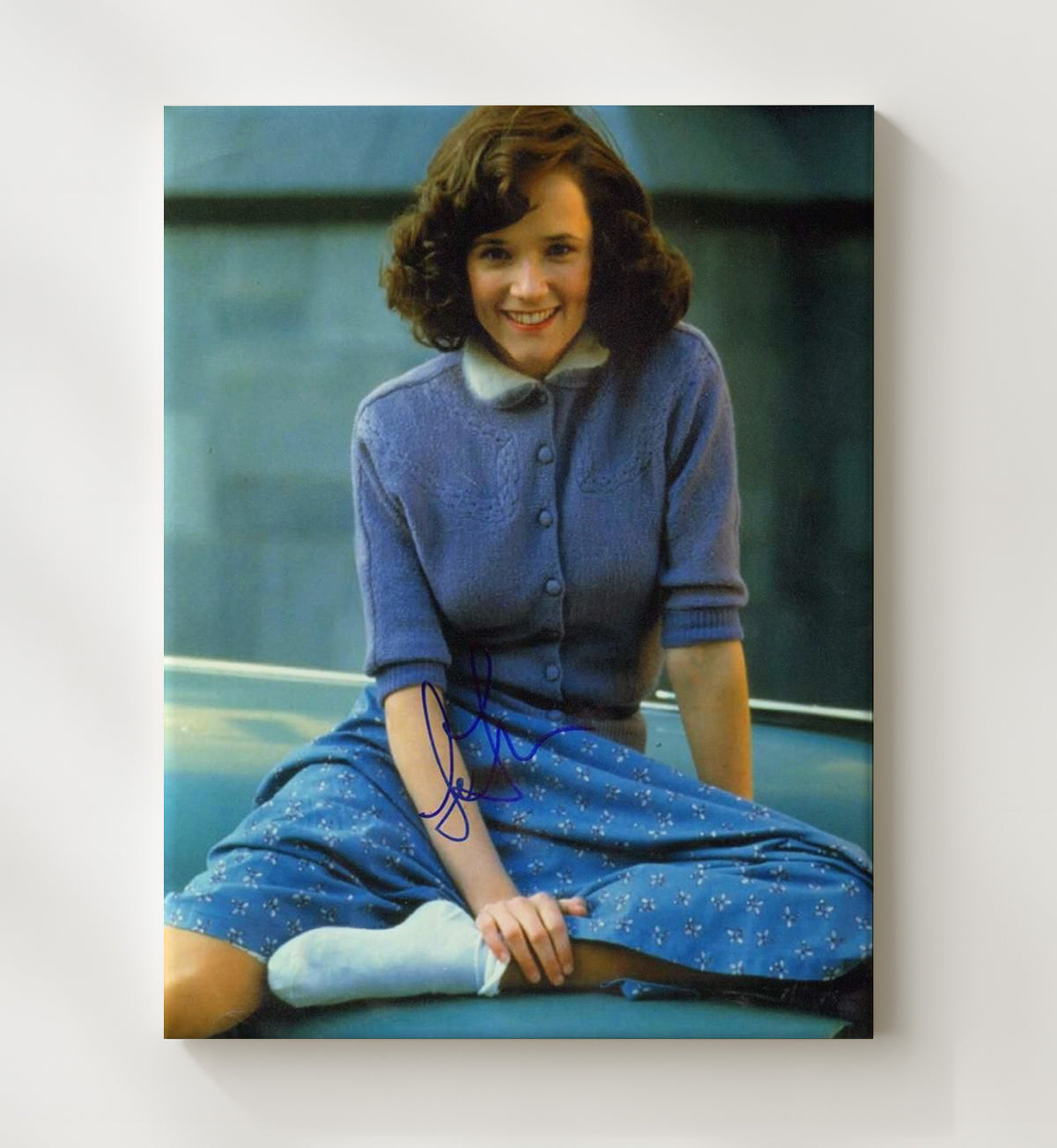 Lea Thompson - Blue Cardigan Smile Sitting movie wall art 20x24 Canvas