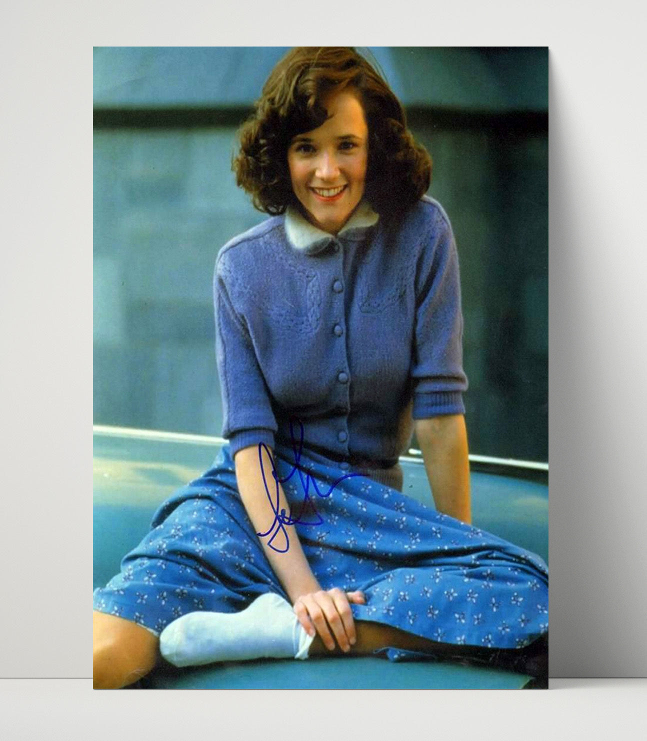 Lea Thompson - Blue Cardigan Smile Sitting movie wall art 16x20 Unframed Print
