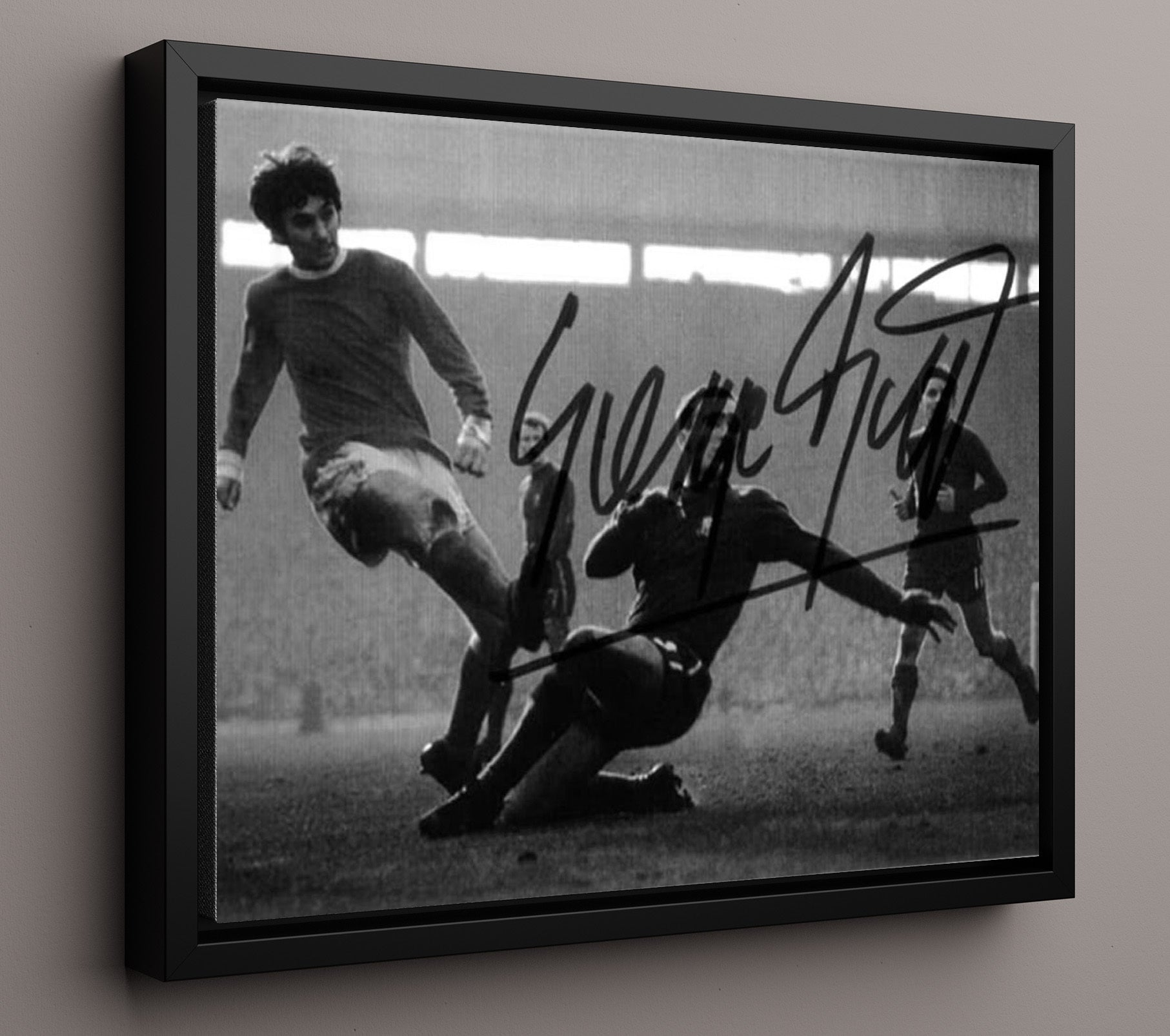 George Best Manchester United Sliding Finish Goal Vintage Match Action Soccer 16x20 Framed Canvas soccer wall art print – Soccer Prints decor